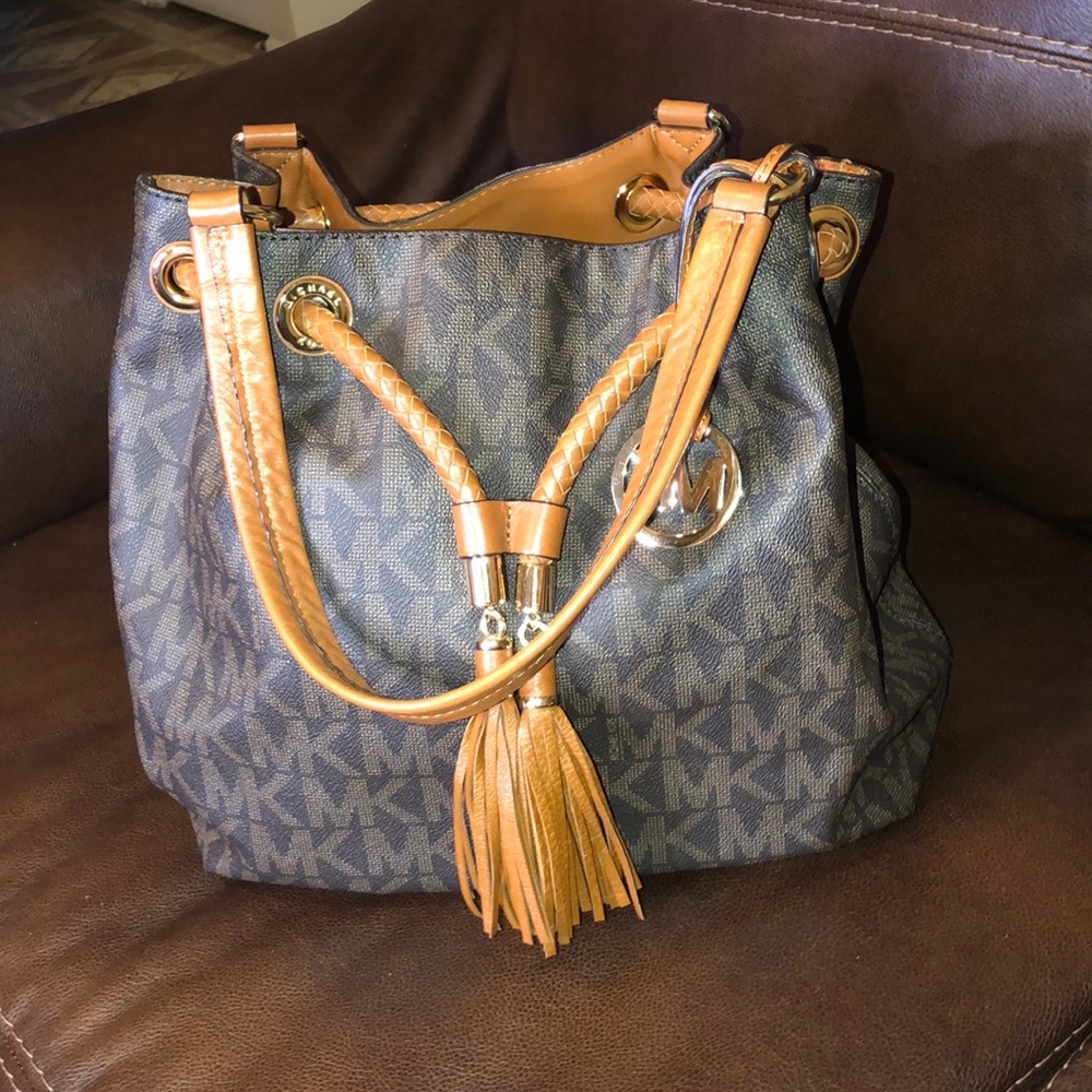 Dark brown, and light brown Michael Kors purse